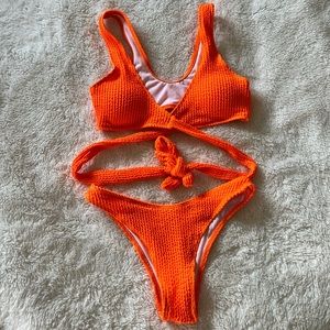 Neon orange swimsuit